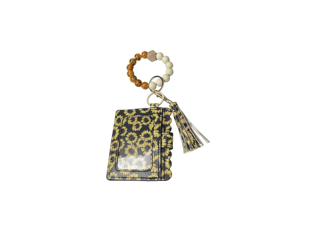 Bright yellow sunflower safety keychain, stylish and discreet personal protection accessory for women