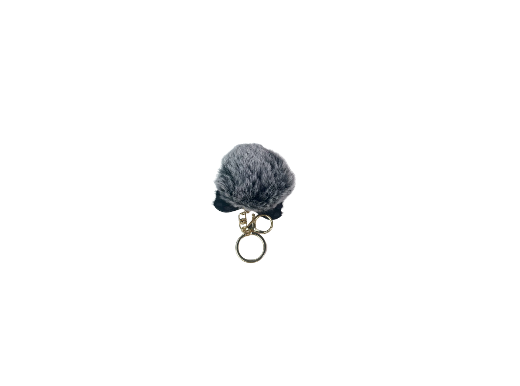 Snakeskin-patterned self-defense keychain set in silver and black and emergency tools